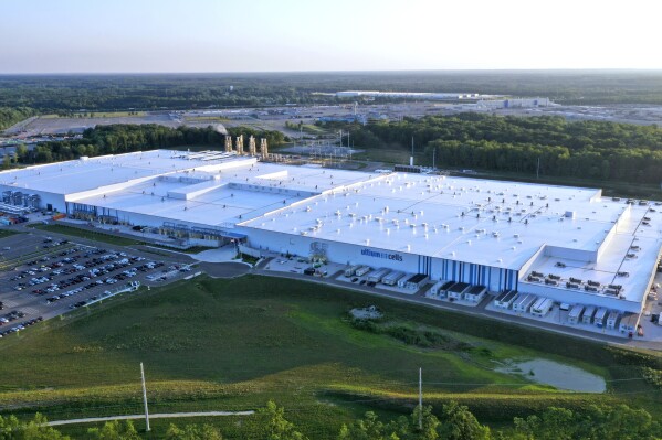 FILE - The Ultium Cell factory in Warren, Ohio, is shown, Friday, July 7, 2023. General Motors is losing money on every electric vehicle it sells, but the company says it's on track to generate mid single-digit pretax profit margins in 2025 as it produces more higher margin EVs, works out kinks in battery manufacturing and sees battery cost reductions. Specificically, the company has had trouble with machinery that stacks battery cells into modules at its Ultium Cells battery plant near Warren, Ohio, a joint venture with LG Energy Solution of Korea. (AP Photo/Gene J. Puskar, File)
