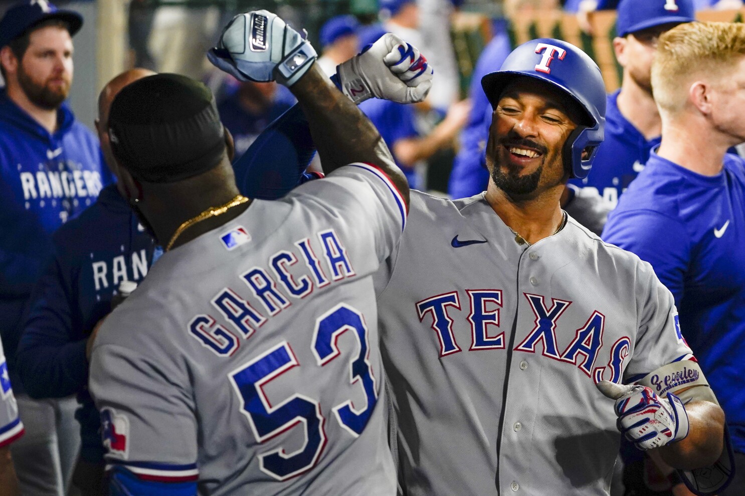 Rangers back Gray with 3 straight homers, beat Angels 5-1 to