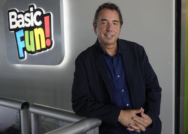 Jay Foreman, CEO of Basic Fun!, stands near the entrance to his toy company, Thursday, April 6, 2023, in Boca Raton, Fla. Foreman had to temporarily scuttle plans for an acquisition due to the credit crunch. (AP Photo/Marta Lavandier)