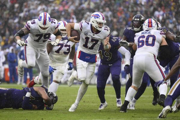 Buffalo Bills quarterback Josh Allen (17) runs for a touchdown against the Baltimore Ravens in the second half of an NFL football game Sunday, Oct. 2, 2022, in Baltimore. (AP Photo/Nick Wass)