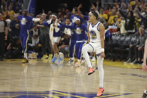 CORRECTS TO GAME 2 INSTEAD OF GAME 1 - Golden State Warriors guard Jordan Poole (3) celebrates after scoring against the Boston Celtics during the second half of Game 2 of basketball's NBA Finals in San Francisco, Sunday, June 5, 2022. (AP Photo/Jed Jacobsohn)