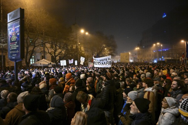 People take part in a protest against scrapping the Special Prosecutor's Office organised by the Slovakian opposition parties in Bratislava, Tuesday, Dec. 19, 2023. (Pavol Zachar/TASR via AP)