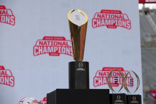 The College Football Playoff National Championship Trophy on display before the Ohio State Buckeyes National Championship celebration at Ohio Stadium in Columbus, Ohio, Sunday, Jan. 26, 2025. (AP Photo/Joe Maiorana, File)