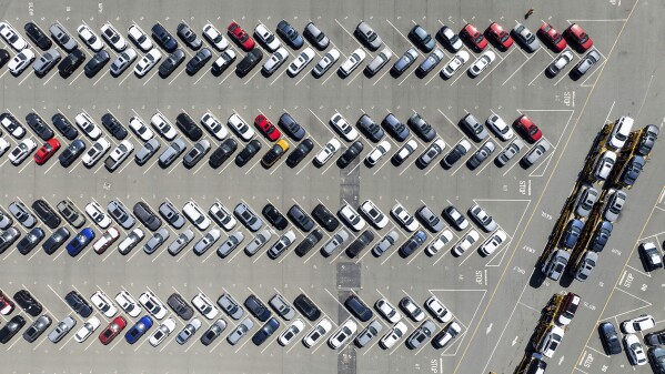 Cars line the BNSF Railway vehicle storage facility at the Port of Richmond on Thursday, April 3, 2025, in Richmond, Calif. (AP Photo/Noah Berger)