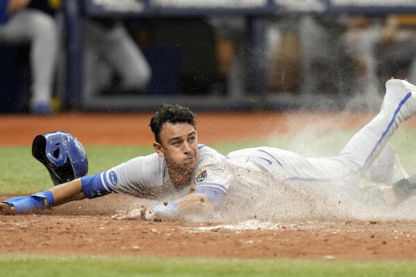 Kansas City Royals' Nicky Lopez scores on a sacrifice fly by Bobby Witt Jr., off Tampa Bay Rays relief pitcher Shawn Armstrong during the fifth inning of a baseball game Sunday, Aug. 21, 2022, in St. Petersburg, Fla. (AP Photo/Chris O'Meara)