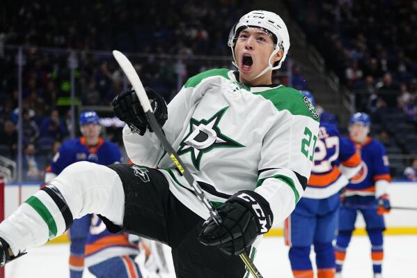 FILE - Dallas Stars' Jason Robertson celebrates after scoring a goal during the first period of an NHL hockey game against the New York Islanders on Jan. 10, 2023, in Elmont, N.Y. The NHL All Star festivities on Feb. 3 and 4, 2023, in South Florida are a showcase of the league's next generation of stars, led by Robertson, New Jersey Devil's Jack Hughes and Buffalo's Tage Thompson. (AP Photo/Frank Franklin II, File)