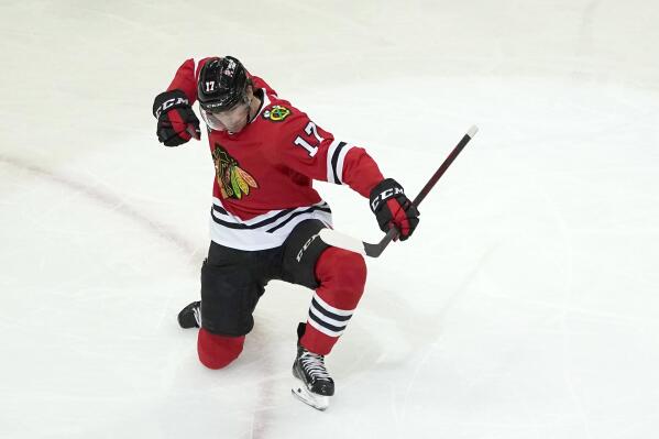 Chicago Blackhawks' Dylan Strome celebrates his goal during the third period of an NHL hockey game against the Arizona Coyotes Friday, Nov. 12, 2021, in Chicago. The Blackhawks won 2-1. (AP Photo/Charles Rex Arbogast)