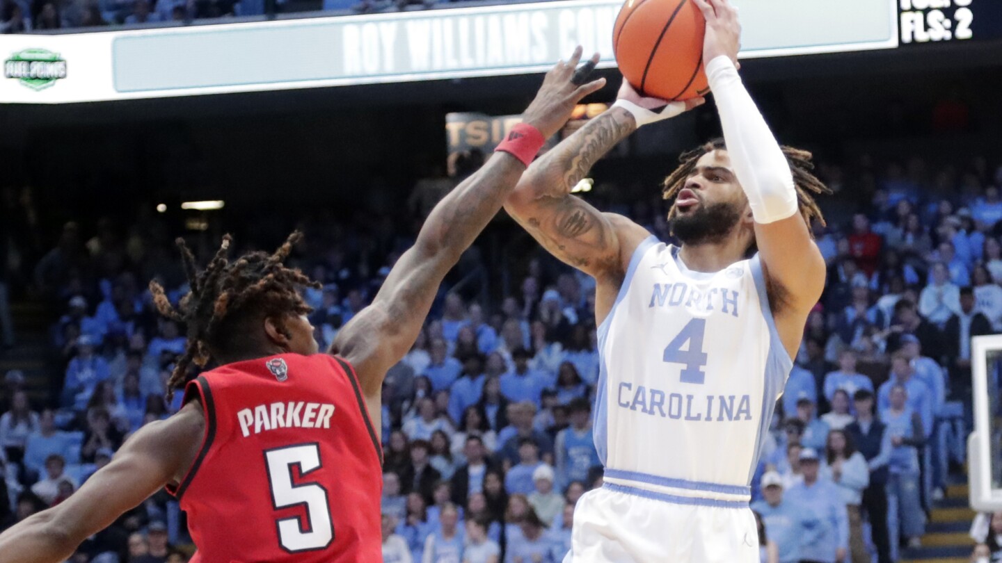 RJ Davis scores 21 to help North Carolina beat NC State 97-73