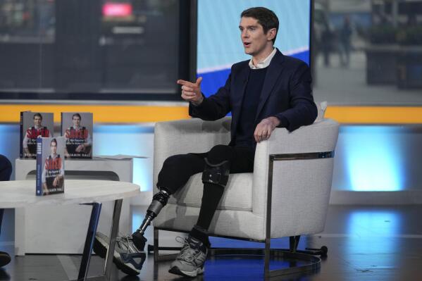 Fox's Hall talks survival after nearly dying in Ukraine | AP News