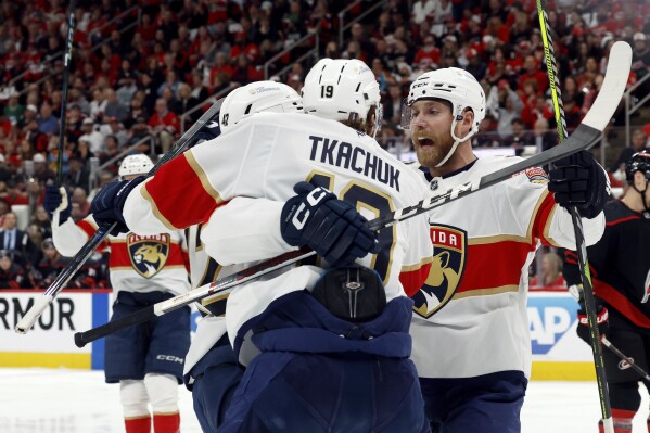 The Florida Panthers celebrate a goal by Gustav Forsling (42) during the first period of Game 2 of the NHL hockey Stanley Cup Eastern Conference finals against the Carolina Hurricanes in Raleigh, N.C., Thursday, May 22, 2025. (AP Photo/Karl DeBlaker)