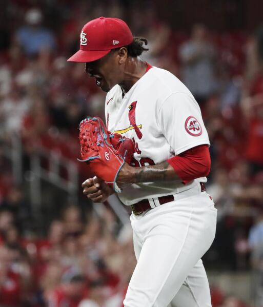 St. Louis Cardinals Nolan Arenado looks skywards after touching