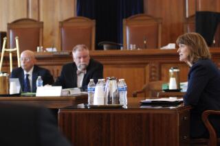 FILE - A nominating commission interviews Supreme Court candidate Shannon Bacon, right, an Albuquerque-based district judge, at the Supreme Court in Santa Fe, N.M., Thursday, Jan. 10, 2018. New Mexico will no longer deny licenses to practice law solely because of an applicant's citizenship or immigration status, including some aspiring law students who arrived in the U.S. illegally as children. "The change in the licensure rule is grounded in the fundamental principle of fairness, and is consistent with New Mexico's historical values of inclusion and diversity," Chief Justice Bacon said in a statement Tuesday, Aug. 23, 2022. (AP Photo/Morgan Lee, File)