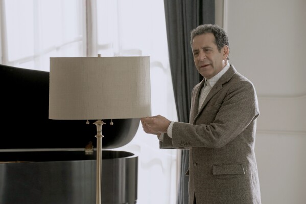 This image released by Peacock shows Tony Shalhoub as Adrian Monk in a scene from "Mr. Monk’s Last Case: A Monk Movie." (Peacock via AP)