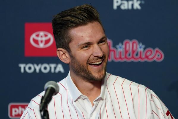 Newly acquired Philadelphia Phillies shortstop Trea Turner laughs during his introductory news conference, Thursday, Dec. 8, 2022, in Philadelphia. (AP Photo/Matt Slocum)