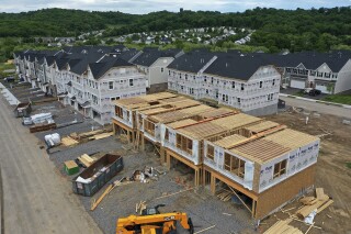 File - Townhomes under construction are shown in Mars, Pa., on May, 27, 2022. On Thursday, Freddie Mac reports on this week's average U.S. mortgage rates. (AP Photo/Gene J. Puskar, File)