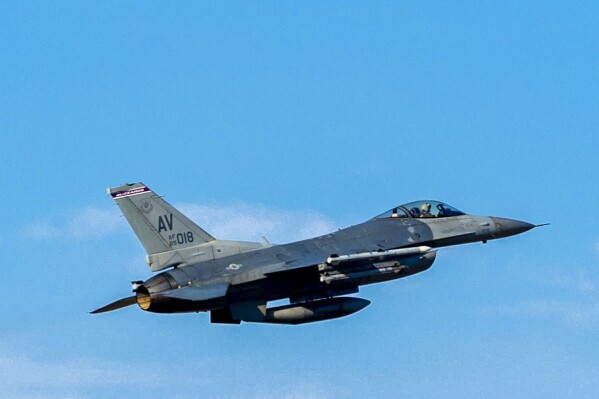 In this photo provided by the US Embassy in Bosnia and Herzegovina, a US Air Force F-16 Fighting Falcon flies as part of joint air-to-ground training involving American and Bosnian forces, on Monday, Jan. 8, 2024. Two U.S. fighter jets flew over Bosnia on Monday in a demonstration of support for the Balkan country's integrity in the face of increasingly secessionist policies of the Bosnian Serb pro-Russia leader Milorad Dodik. (US Embassy in Bosnia and Herzegovina via AP)
