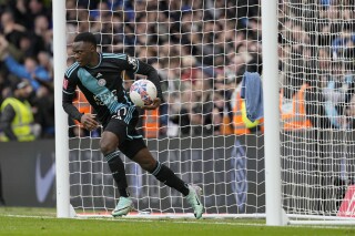 Leicester City's Patson Daka runs back with the ball after Chelsea's Axel Disai scored an own goal during the FA Cup quarterfinal soccer match between Chelsea and Leicester City at Stamford Bridge in London, Sunday, March 17, 2024. (AP Photo/Dave Shopland)