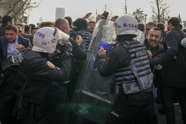 Supporters of Istanbul mayor clash with police as he testifies over legal probes against him | AP News