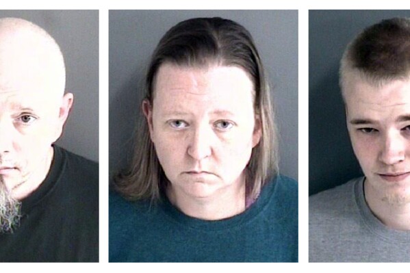 FILE - This combo of booking images provided by the Story County, Iowa, Sheriff's Office, show, from left, Gary Graham Jr., 44, Danielle Graham, 42, Aaron Williams, 20, all from Zearing, Iowa, were charged Monday, March 18, 2024, with first-degree kidnapping and willful injury. A fourth member, a 16-year-old girl, was not named. The four members have pleaded not guilty, Monday, April 15, 2024, in the abduction and abuse of an 18-year-old relative who had allegedly showed up at a hospital so badly beaten that his brain was bleeding and so malnourished that he weighed just 70 pounds (32 kilograms), according to court documents. (Story County Sheriff's Office via AP, File)