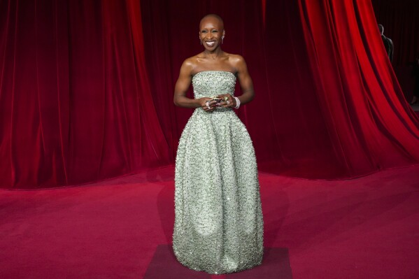 FILE - Cynthia Erivo arrives at the fourth annual Academy Museum Gala on Saturday, Oct. 19, 2024, at the Academy Museum of Motion Pictures in Los Angeles. In “Wicked,” Elphaba and Glinda travel from Shiz University to the Emerald City on a glistening green train to meet the wizard. In real life, Cynthia Erivo and Ariana Grande have traveled much farther and wider and longer and on airplanes to promote their hotly anticipated film. (Photo by Jordan Strauss/Invision/AP, File)