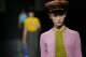 A model wears a creation as part of the Prada women's Fall-Winter 2024-25 collection presented in Milan, northern Italy, Thursday, Feb. 22, 2024. (AP Photo/Luca Bruno)