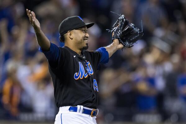 New York Mets relief pitcher Edwin Diaz celebrates the win after a baseball game against the Pittsburgh Pirates, Friday, Sept. 16, 2022, in New York. (AP Photo/Corey Sipkin)