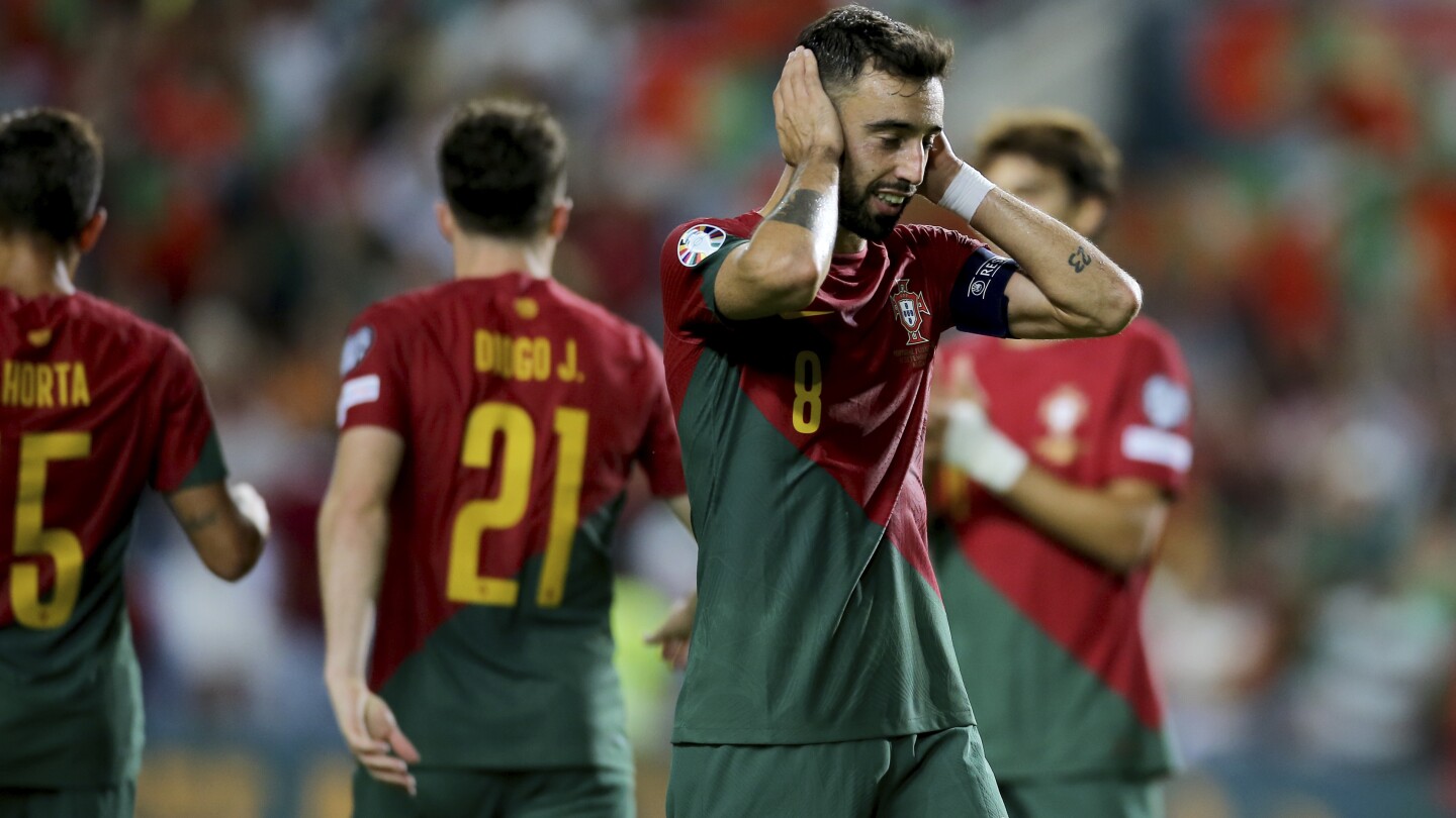 Portugal routs Luxembourg in record 9-0 win without suspended Ronaldo. Drone delays Armenia-Croatia