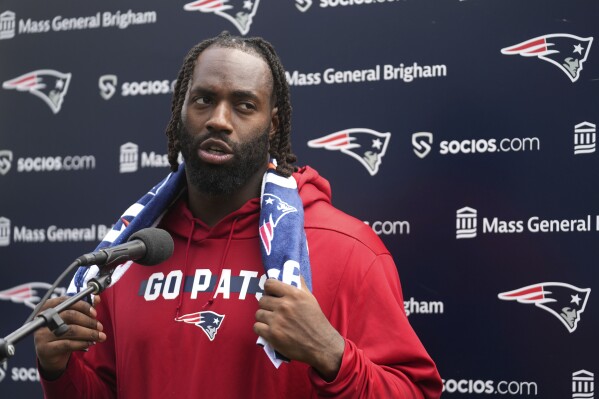 New England Patriots linebacker Matthew Judon speaks with reporters following an NFL football practice, Tuesday, June 13, 2023, in Foxborough, Mass. (AP Photo/Steven Senne)
