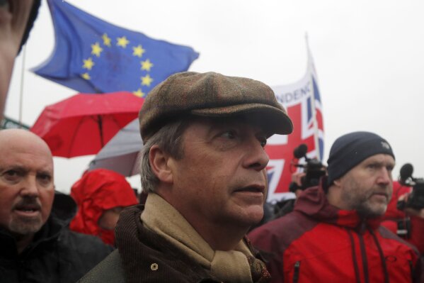 
              Former UKIP party leader Nigel Farage joins the start of the first leg of March to Leave the European Union, in Sunderland, England, Saturday, March 16, 2019. Hard-core Brexiteers led by former U.K. Independence Party leader Nigel Farage set out on a two-week "Leave Means Leave" march between northern England and London, accusing politicians of "betraying the will of the people." (AP Photo/Frank Augstein)
            