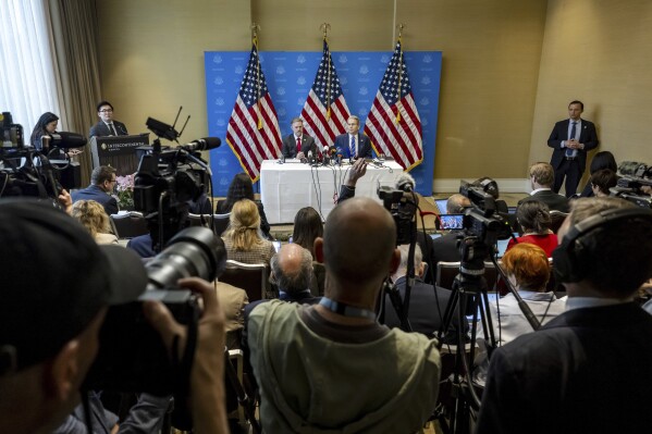 U.S. Trade Representative Jamieson Greer, left, and U.S. Secretary of the Treasury Scott Bessent take part in a press conference after two days of closed-door discussions on trade between the United States and China, in Geneva, Switzerland, Monday, May 12, 2025. (Jean-Christophe Bott/Keystone via AP)