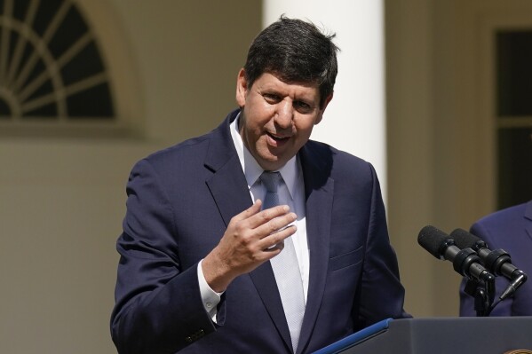 FILE - President Joe Biden's nominee to lead the Bureau of Alcohol, Tobacco, Firearms and Explosives, Steve Dettelbach speaks during an event in the Rose Garden of the White House in Washington, April 11, 2022. The Biden administration is proposing a new rule that would require thousands more firearms dealers to run background checks, in an effort to combat rising gun violence nationwide. Background checks help prevent guns from being sold to people convicted of crimes, teenagers and others who are legally blocked from owning them, said ATF Director Steve Dettelbach. (AP Photo/Carolyn Kaster, File)