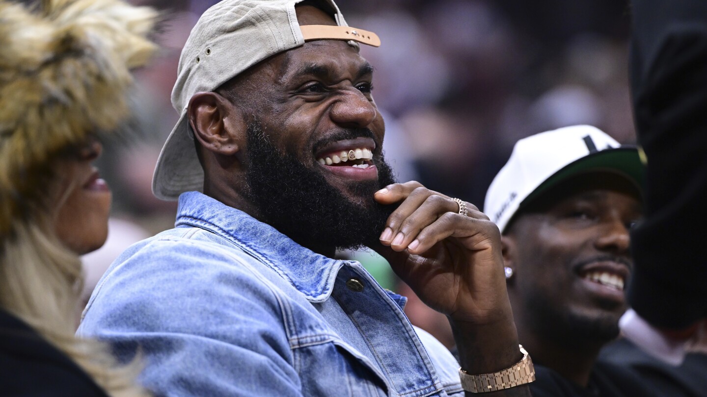 LeBron James attends Game 4 between Celtics and Cavaliers in Cleveland, his old stomping grounds - The Associated Press