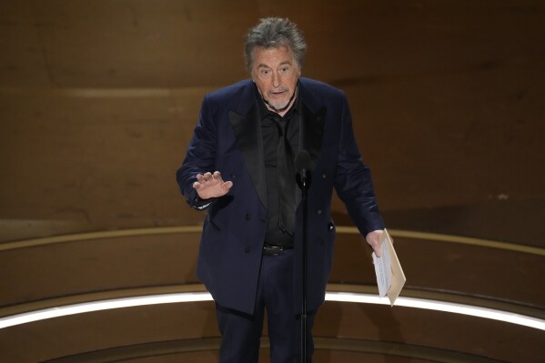 Al Pacino presents the award for best picture during the Oscars on Sunday, March 10, 2024, at the Dolby Theatre in Los Angeles. (AP Photo/Chris Pizzello)