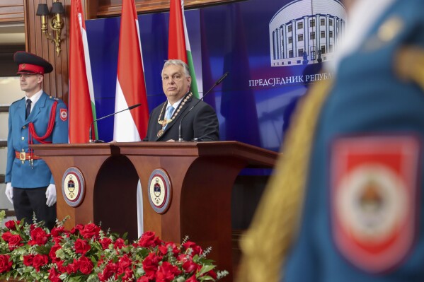 In this photograph made available by the Republika Srpska Presidential Press Service, Hungary's Prime Minister Viktor Orban speaks after receiving the Order of Republika Srpska from Bosnian Serb leader Milorad Dodik during his visit to Banja Luka, Bosnia, Friday, April 5, 2024. Orban is on a two-day visit to Bosnia and Herzegovina. (Republika Srpska Presidential Press Service via AP)