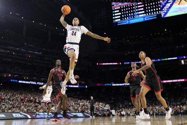 Connecticut guard Jordan Hawkins shoots against San Diego State during the second half of the men's national championship college basketball game in the NCAA Tournament on Monday, April 3, 2023, in Houston. (AP Photo/David J. Phillip)