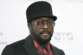 FILE - In this Sept. 23, 2017 file photo, will.i.am attends the 27th annual EMA Awards at Barker Hangar in Santa Monica, Calif. The Black Eyed Peas musician has accused a flight attendant from Australia’s national carrier Qantas of being racist and rude to him on a flight. The musician said he was met by police at Sydney Airport on Saturday, Nov. 16, 2019, after an incident with an “overly aggressive flight attendant” who he says was upset with him because he couldn’t hear her through his noise-cancelling headphones. Qantas said in a statement it rejected the allegation that the incident had anything to do with race and said it was a “misunderstanding.” (Photo by Richard Shotwell/Invision/AP, File)