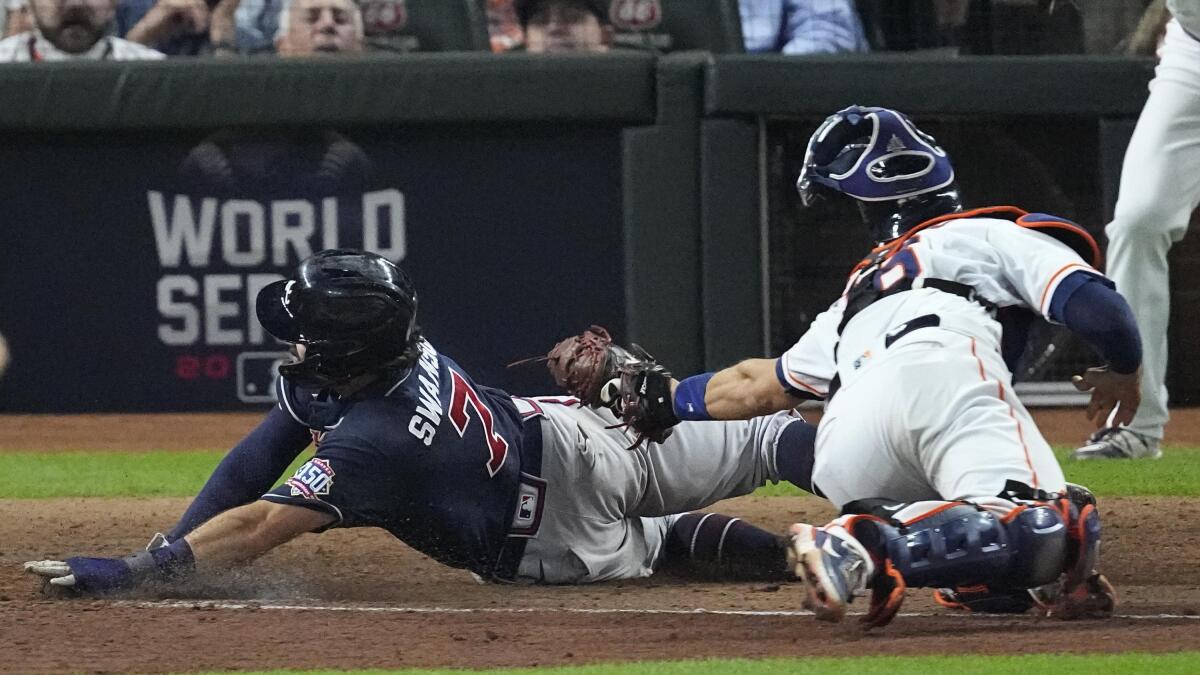 The Latest: Braves take 1-0 Series advantage over Astros