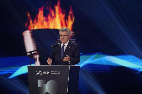 International Olympic Committee President Thomas Bach addresses a ceremony on the 50th anniversary of the deadly attack on the Israeli Olympic team at the 1972 Summer Olympics in Munich by a Palestinian militant group, in Tel Aviv, Israel, Wednesday, Sept. 21, 2022. The head of the International Olympic Committee has apologized for the organization's longtime failure to commemorate 11 Israeli athletes killed by Palestinian militants at the 1972 Munich Olympics. Bach said the Palestinian attack in Munich was one of "the darkest days in Olympic history" and an assault on the Olympic Games and its values. (AP Photo/Maya Alleruzzo)
