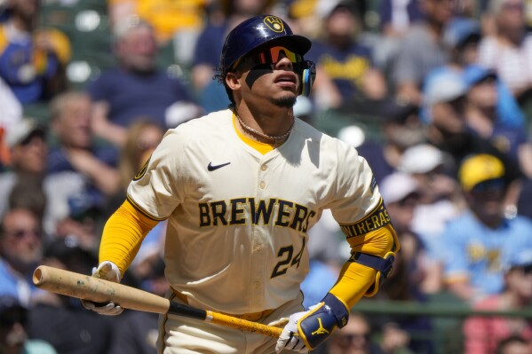 Milwaukee Brewers' William Contreras watches his RBI triple during the sixth inning of a baseball game against the Pittsburgh Pirates Wednesday, May 15, 2024, in Milwaukee. (AP Photo/Morry Gash)