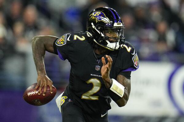 Baltimore Ravens quarterback Tyler Huntley (2) scrambles against the Pittsburgh Steelers in the first half of an NFL football game in Baltimore, Sunday, Jan. 1, 2023. (AP Photo/Julio Cortez)