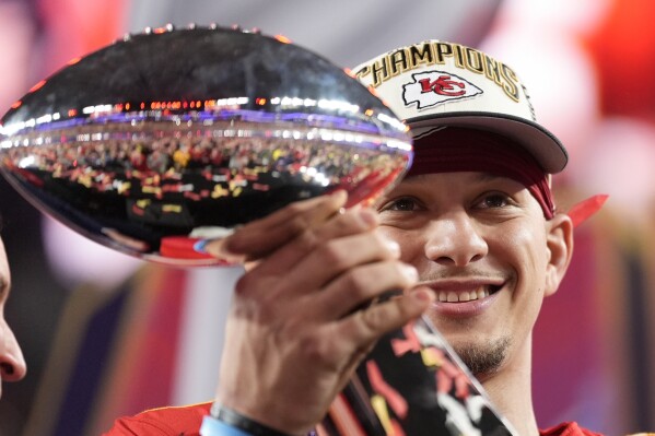 Kansas City Chiefs quarterback Patrick Mahomes holds the Vince Lombardi Trophy after the NFL Super Bowl 58 football game against the San Francisco 49ers on Sunday, Feb. 11, 2024, in Las Vegas. The Chiefs won 25-22. (APPhoto/Ashley Landis)