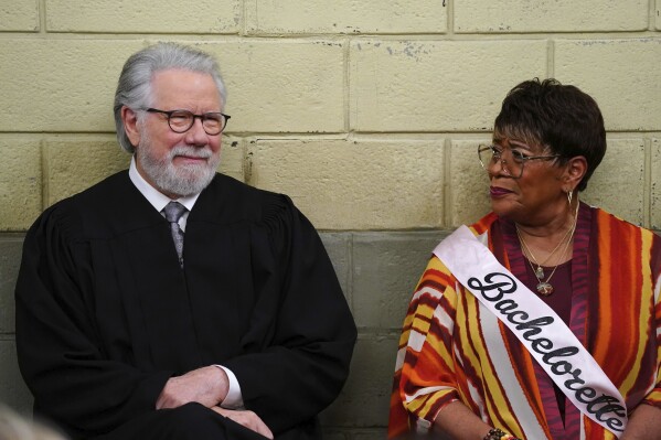 This image released by NBC shows John Larroquette as Dan Fielding, left, and Marsha Warfield as Roz in a scene from the 