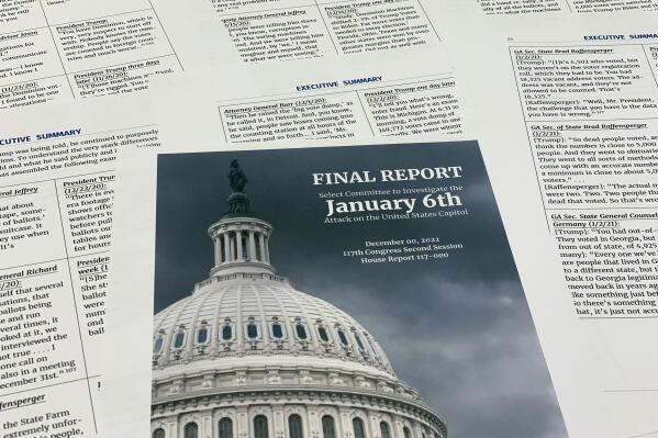 The final report released by the House select committee investigating the Jan. 6 attack on the U.S. Capitol, is photographed Thursday, Dec. 22, 2022. (AP Photo/Jon Elswick)