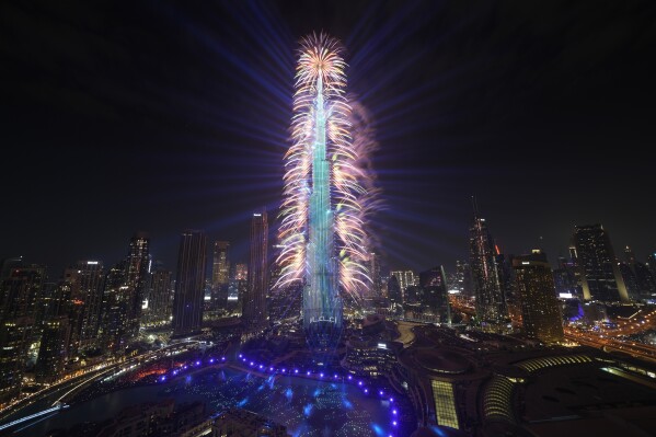 Fireworks explode at the Burj Khalifa, the world's tallest building, during the New Year's Eve celebration, in Dubai, United Arab Emirates, Monday, Jan. 1, 2024. (AP Photo/Kamran Jebreili)