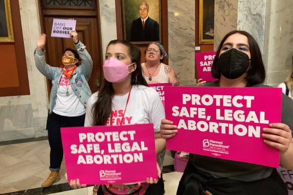 FILE - Abortion-rights supporters hold their protest at the Kentucky Capitol in Frankfort, Kentucky, on April 13, 2022.  A pregnant woman in Kentucky filed a lawsuit on Friday, December 8, 2023, challenging the state's sweeping abortion ban, saying it is right.  Terminating pregnancy is important for people "“Take control of their lives.”  The lawsuit, filed in state court in Louisville, says Kentucky's nearly complete ban against abortion violates the plaintiffs' rights to privacy and self-determination under the state constitution.  (AP Photo/Bruce Schreiner, File)