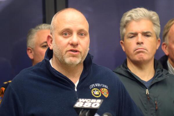 Noel DiGerolamo, left, President of the Suffolk County Police Benevolent Association, and Suffolk County Executive Steven Bellone, speak with reporters at a news conference at Stony Brook University Hospital, Thursday, March 12, 2015 in Stony Brook, N.Y. A Suffolk County police officer was shot and wounded while confronting a suspect who fled a traffic stop, police officials said. Officer Mark Collins, who is expected to survive, was in plain-clothes and driving an unmarked vehicle when he stopped a car for a vehicle and traffic violation on Route 25 in Huntington Station. A suspect is in custody. (AP Photo/Mike Balsamo)