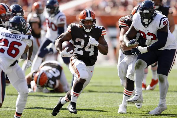 Cleveland Browns running back Nick Chubb (24) rushes for a 26-yard touchdown during the second half of an NFL football game against the Houston Texans, Sunday, Sept. 19, 2021, in Cleveland. (AP Photo/Ron Schwane)