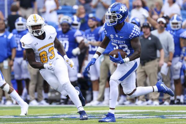 Kentucky defensive back Tyrell Ajian (23) returns an interception 95-yards for a touchdown late in the fourth quarter of an NCAA college football game against Chattanooga in Lexington, Ky., Saturday, Sept. 18, 2021. (AP Photo/Michael Clubb)