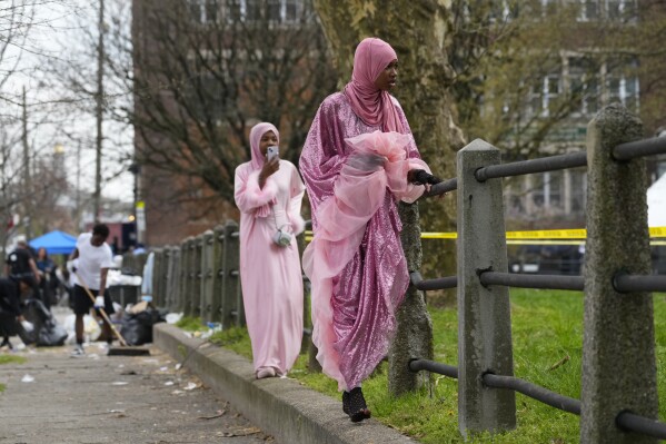 People view the aftermath of a shooting at an Eid al-Fitr event in Philadelphia, April 10, 2024. The annual event that marks the end of Ramadan, held outside a mosque in the city’s Parkside neighborhood, came to a sudden end when shots rang out leaving at least three people injured. (AP Photo/Matt Rourke)