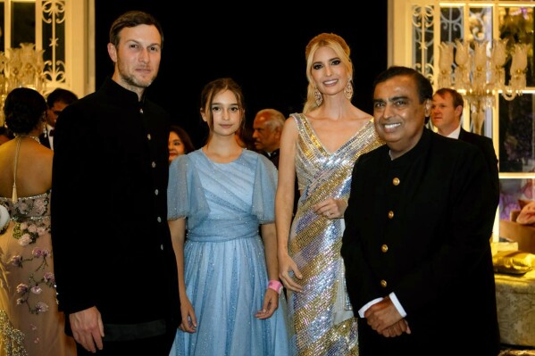 This photograph released by the Reliance group shows from L to R, Jared Kushner, daughter Arabella and Ivanka Trump posing for a photograph with billionaire industrialist Mukesh Ambani, right, at a pre-wedding bash of Ambani's son Anant Ambani in Jamnagar, India, Friday, Mar. 01, 2024. (Reliance group via AP)